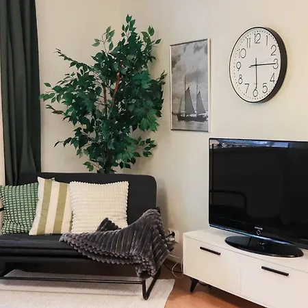 Green-themed Modern Studio At The Center Apartment Helsinki