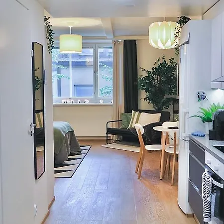 Green-themed Modern Studio At The Center